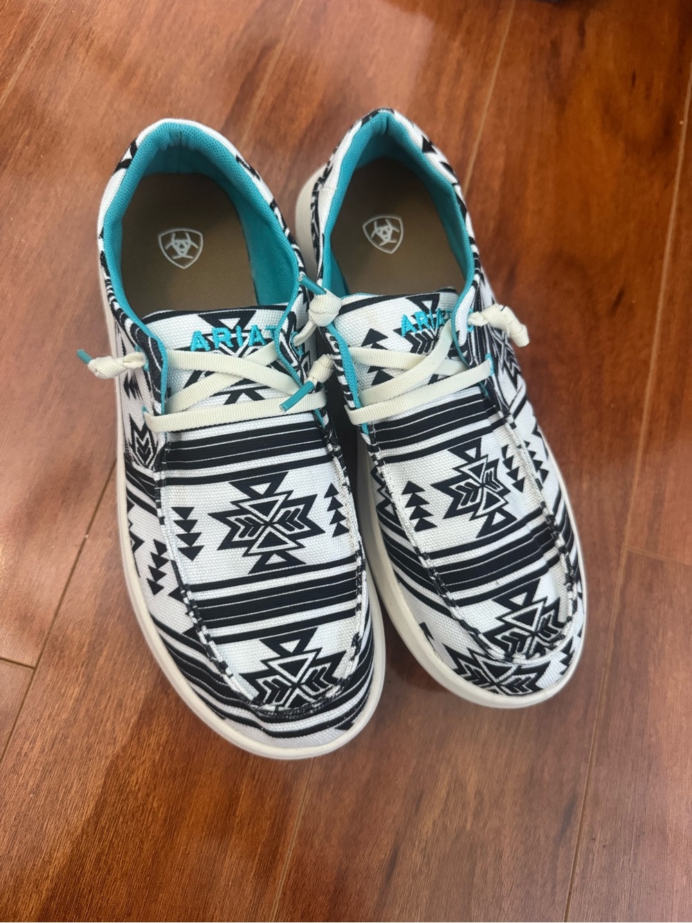Ariat womens Black & White Aztec Pattern Slip-On Sneakers with Teal Lining